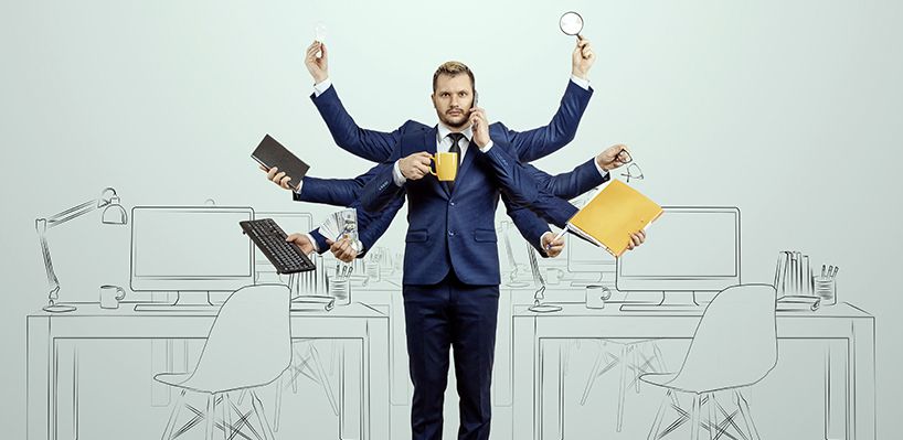 Businessman with many hands in a suit. Works simultaneously with several objects, a mug, a magnifying glass, papers, a contract, a telephone. Multitasking, efficient business worker concept