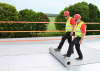 TPO_roofers_unrolling_membrane_01_450x320px.jpg